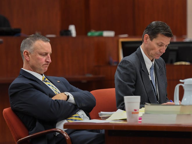 Chief Assistant State Attorney Tom Bakkedahl (left) and Assistant State Attorney Steve Gosnell wait to question another member of a jury pool on Tuesday, April 9, 2019, for the retrial of defendant Henry Lee Jones Jr., at the Indian River County Courthouse in Vero Beach. Jones Jr. was convicted in 2014 for the murder of Vero Beach resident Brian Simpson, who died in his barrier island home during an armed burglary in 2011, but is being retried due to error in jury selection in the first trial, involving racial prejudice.
