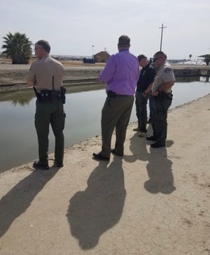 A body found in a Tulare canal not far from where an abandoned car belonging to a missing man was discovered.