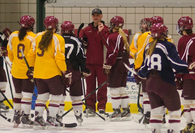 Norwich women's hockey coach Mark Bolding addresses his team during practice  in Northfield ahead of the Cadets' game against  Wisconsin-River Falls in the 2014 Division III national semifinals in Plattsburgh, N.Y.