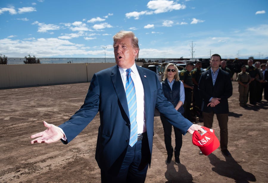 President Donald Trump tours the border wall between the United States and Mexico in Calexico, Calif., on April 5, 2019.