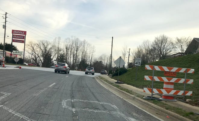 Paving at I-40 and Hendersonville Road at exit 50 should take place in the next week or two, temperatures permitting. The project was supposed to wrap up last October but was delayed.