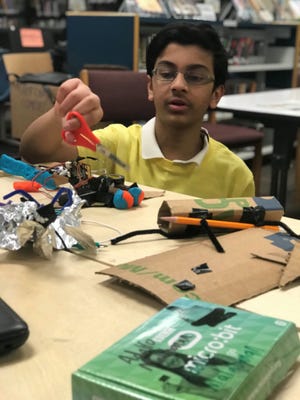Students from Woodrow Wilson Middle School in Edison were tasked to build a prototype gadget to solve a problem in their community as part of Tata Consultancy Services’ goIT program. Pictured is student Sanjay Ravishankar, designing and building his own Micro:Bit-powered gadget.