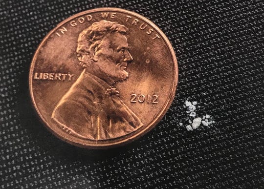 The fentanyl shown next to this penny is a lethal dose, according to federal agents.