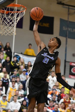 Emoni Bates averaged 28.5 points and 10.2 rebounds as a freshman, helping Ypsilanti Lincoln win its first state title.