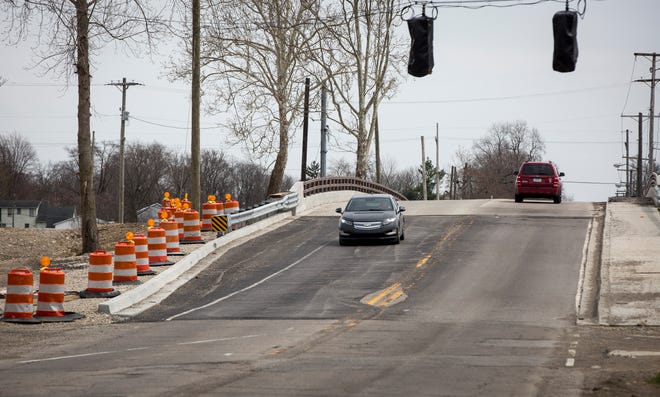 Cars in both the eastbound and westbound lanes travel over the East Jackson Street bridge in both directions without the use of the traffic signal in this Star Press photo from April 2019.