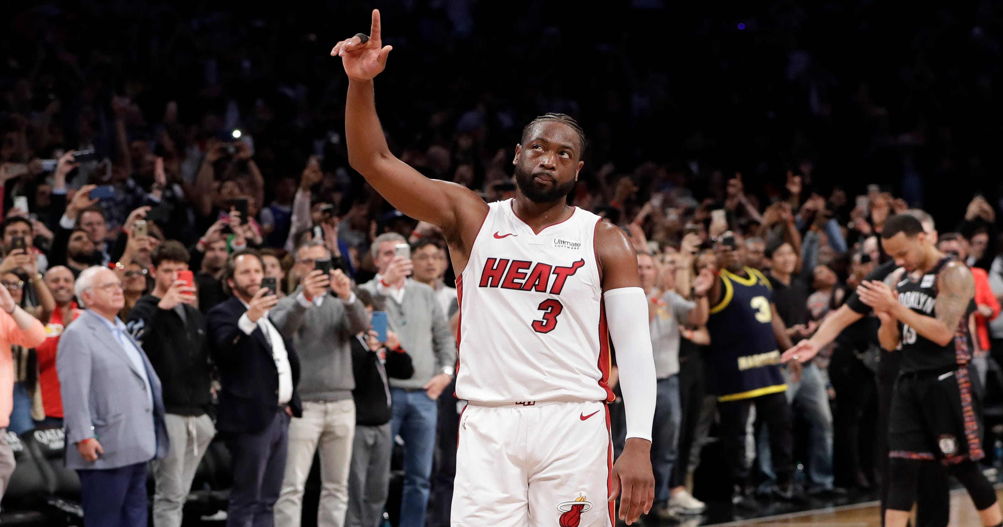 Dwyane Wade goes out with tripledouble in final career game
