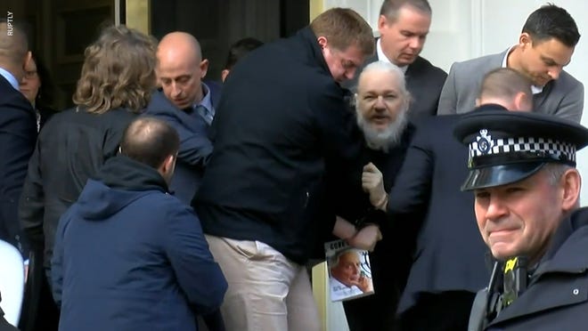 WikiLeaks founder Julian Assange during his arrest in London in 2019.
