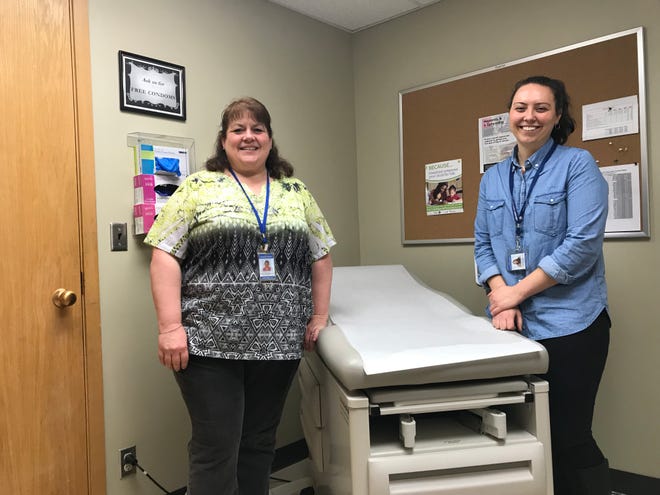 Calhoun County Public Health Department Personal Health Manager Michelle Thorne and Health Educator Alyse Nichols inside one of the Public Health Clinic rooms where soon patients in need of reproductive health services can visit.
