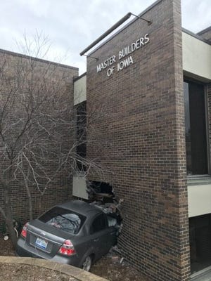 A vehicle drove into Master Builders of Iowa building in downtown Des Moines on Friday afternoon.