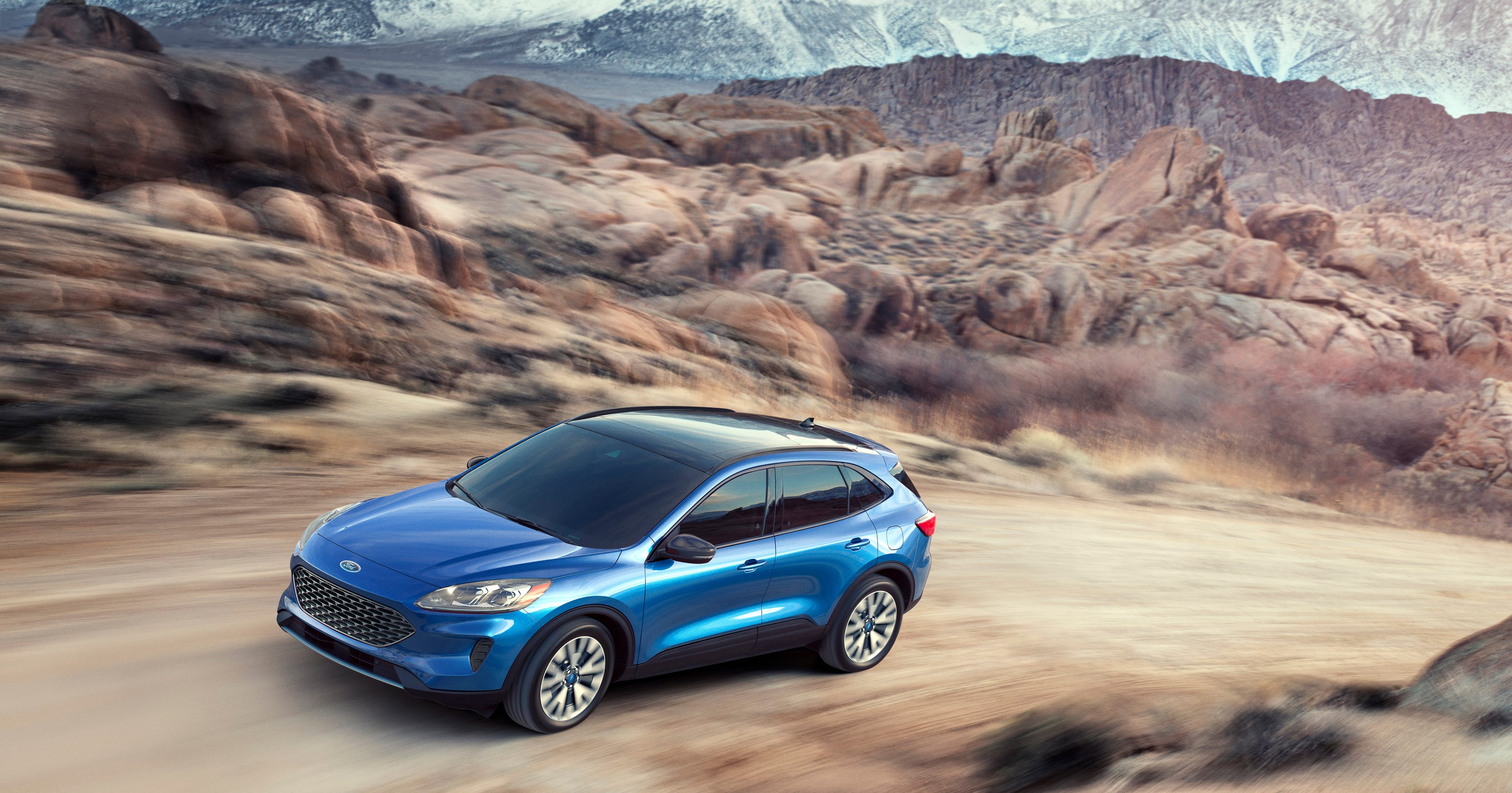 Ford Bets On Hybrid Strategy As Other Automakers Switch To Electric