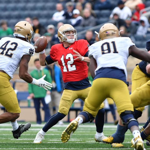 Notre Dame Fighting Irish quarterback Ian Book...