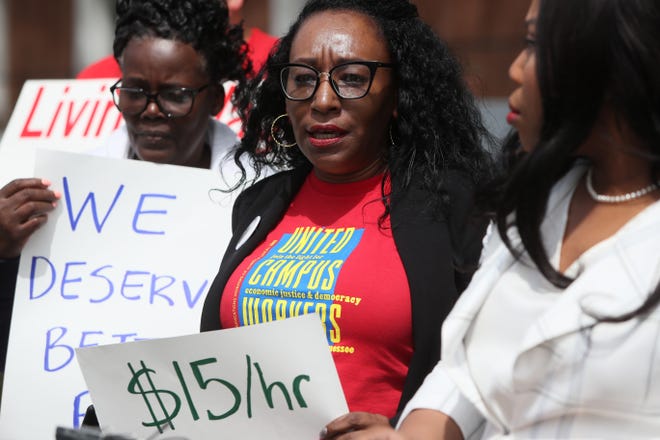 Margaret Cook, vice president of the Memphis chapter of United Campus Workers, speaks during a press conference to address implementing a $15 minimum hourly wage for all campus employees at the University of Memphis on Friday, April 12, 2019. 