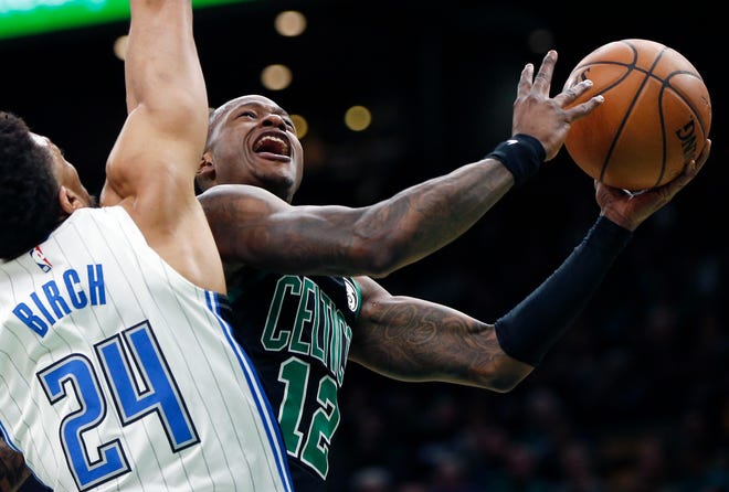 Celtics guard Terry Rozier puts up a shot during a game against the Magic on April 7.