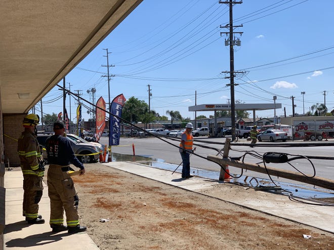 Visalia firefighters are on scene of a crash near Ben Maddox Way and Goshen Avenue. A vehicle crashed into a pole around 2 p.m. on Friday, April 12.