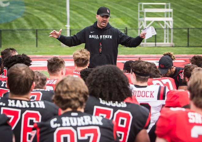 Ball State's Mike Neu talks to the team after the annual Spring Game at Scheumann Stadium Saturday, April 13, 2019.