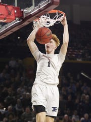 Pinnacle's Nico Mannion (1) has an easy slam against Chaparral during the 6A Boys State Championship at Wells Fargo Arena in Tempe Tuesday, Feb 26, 2019.