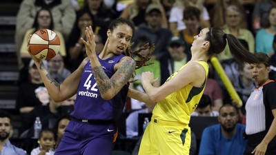 Seattle's Breanna Stewart, right, suffered a serious leg injury Sunday playing against the Mercury's Brittney Griner (42) in the EuroLeague final. The two met last summer in the 2018 WNBA playoff semifinals.