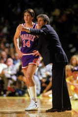 Suns coach John MacLeod talks with Jeff Hornacek during a game against the Lakers in 1987.