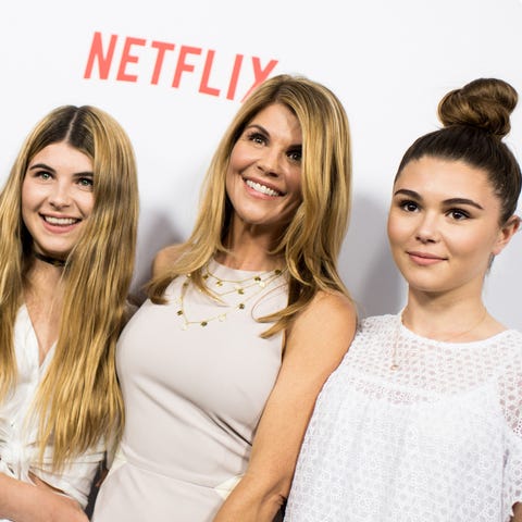 Lori Loughlin and husband plead not guilty in...