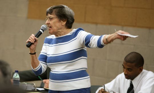 Greta Rogers speaks her mind during a 2009 public hearing on city budget cuts, at Pecos Community Center in Ahwatukee.