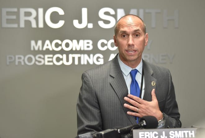 Macomb County Prosecutor Eric Smith says Wednesday at a press conference he is cooperating with investigators looking into his use of forfeiture funds.