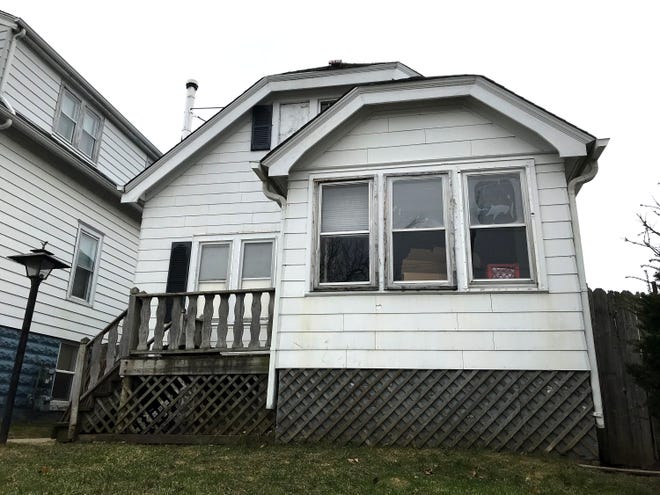 A home in a quiet South Milwaukee neighborhood sits unoccupied after a father and three sons are charged in connection with alleged years-long sexual assaults by the sons on their younger siblings.