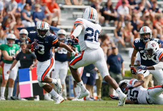 Auburn running back D.J. Williams (3) carries during the A-Day game at Jordan-Hare Stadium on April 13, 2019.