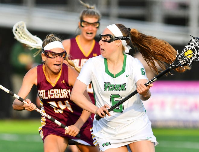 York College' Meghan Fox, seen here at right in a meeting earlier this season vs. Salisbury, had four goals and an assist on Saturday in a 13-11 win over Salisbury in the Capital Athletic Conference Tournament title match.