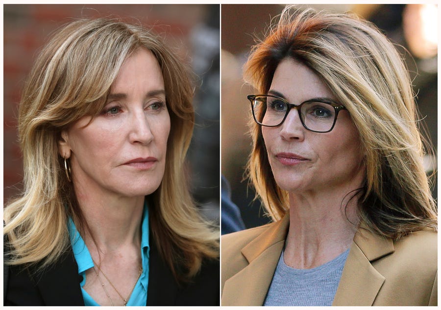 Felicity Huffman, left, and Lori Loughlin outside of federal court in Boston on  April 3, where they faced charges in a nationwide college admissions bribery scandal.