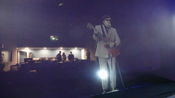 Looking at Roy Orbison's hologram behind a video screen