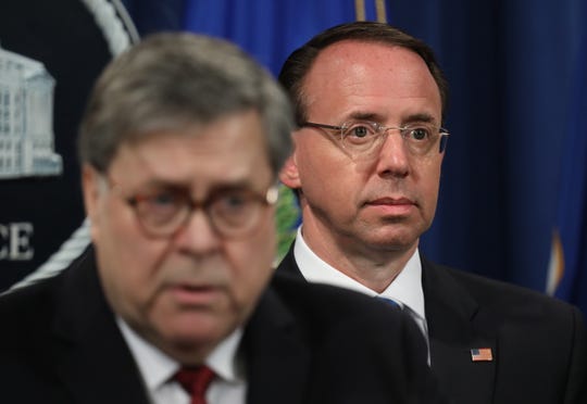 Deputy Attorney General Rod Rosenstein joins U.S. Attorney General William Barr as he speaks during a press conference on the release of the redacted version of the Mueller Report.
