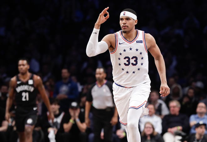 Philadelphia 76ers' Tobias Harris (33) reacts after making a 3-pointer during the second half on Thursday.