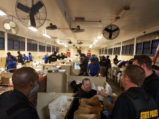Officers during the search of Holman prison on April 18, 2019.