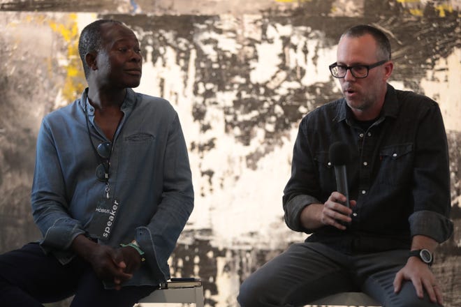 Francis Kéré and Phillip K. Smith III speak on a panel about art and public space at the Mobius 2019 conference in Palm Desert, Calif., April, 18, 2019.