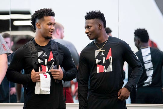 Could the Arizona Cardinals select Oklahoma quarterback Kyler Murray (left) and Sooners wide receiver Marquise Brown (right) with their first two picks in the 2019 NFL draft?