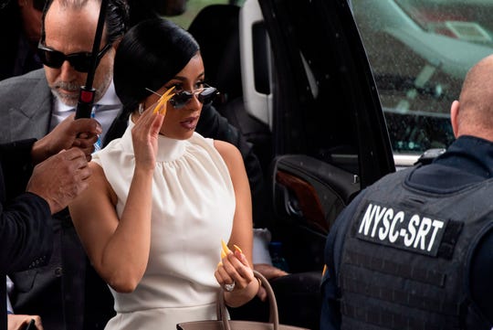Cardi B arrives at the Queens Criminal Court in New York for a hearing on his alleged involvement in a strip club fight on April 19, 2019.