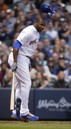Brewers centerfielder Lorenzo Cain reacts after getting hit by a pitch during the seventh inning.