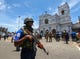 Sri Lankan security forces secure the area around St. Anthony's Shrine after an explosion in Kochchikade, Sri Lanka on April 21, 2019.