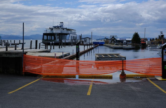 The waters of Lake Champlain flood the King Street ferry terminal in Burlington on Sunday, April 21, 2019.