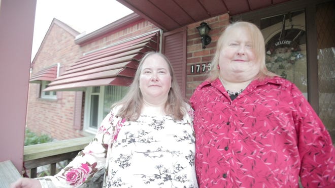 Aimee Stephens, at right, and wife Donna. Stephens, who is transgender, has argued that her firing by a funeral home outside Detroit violated federal law barring sex discrimination in the workplace.