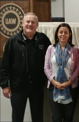 Mike Grimes, left, and UAW Vice President Cindy Estrada.