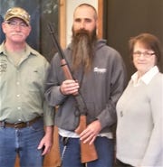 Viking Bow and Gun Club Hunter Safety Program recently received a donation of a 30/30 lever action rifle from the family of the late Jerry Luebke. Pictured from left; Jeff Lyon, lead hunter safety instructor at Viking, accepts the donated rifle from Jerry’s son, Jeff Luebke, and his wife, Marilyn. Jerry was a long-time hunter safety instructor in Manitowoc County.