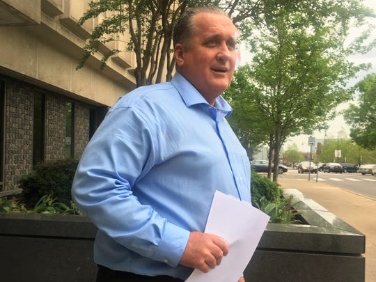 John Polston walks out of the federal courthouse in Nashville on April 18 after a court appearance. Polston is the pharmacist in charge at Dale Hollow Pharmacy.