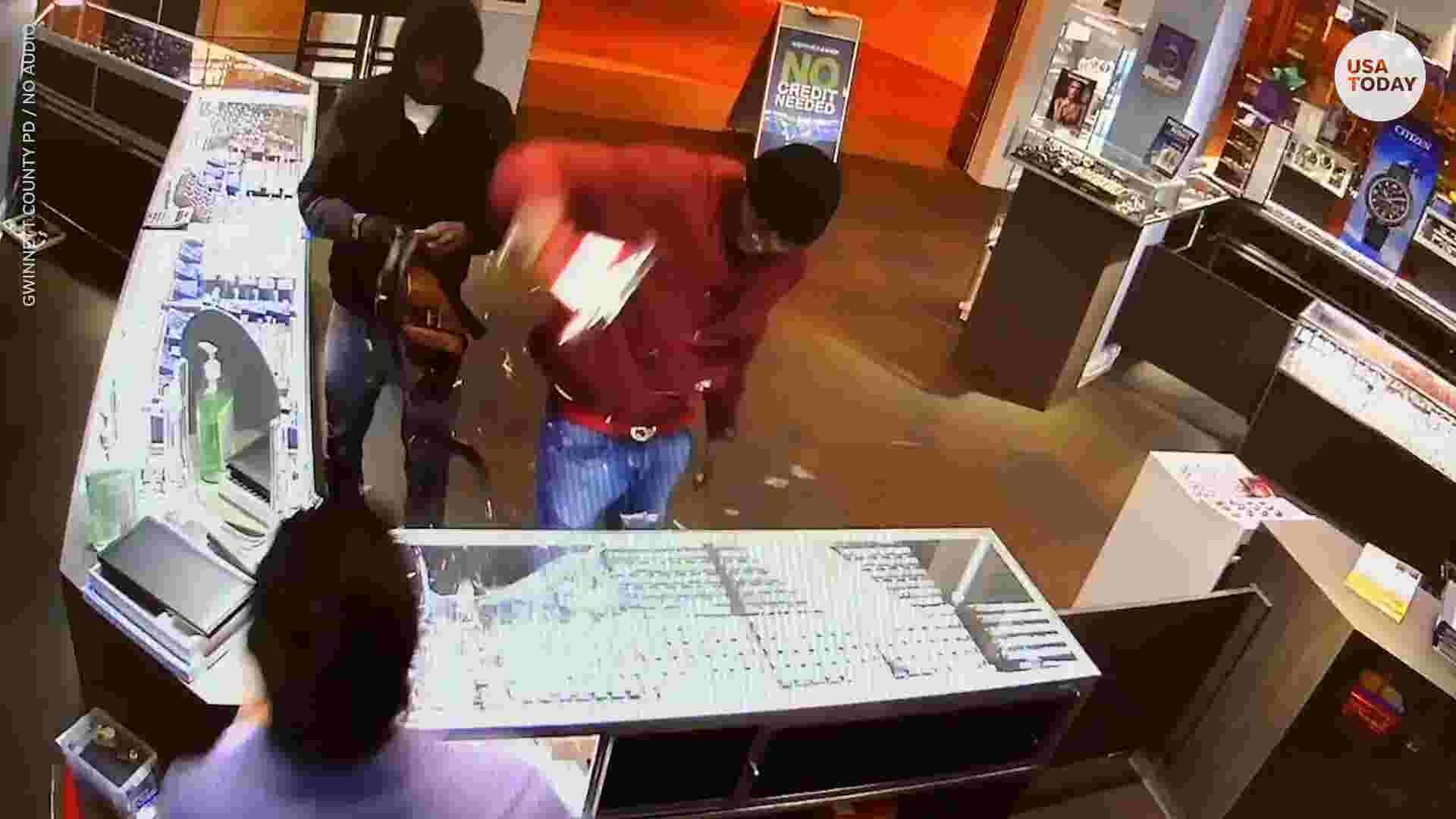 Surveillance shows robbers using hammer to steal $100,000 in jewelry