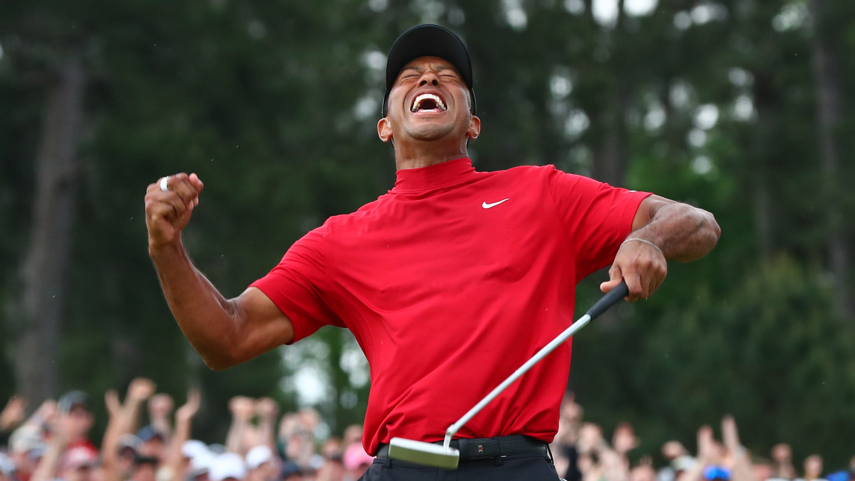 Tiger Woods' Masters victory Story behind iconic photos at Augusta