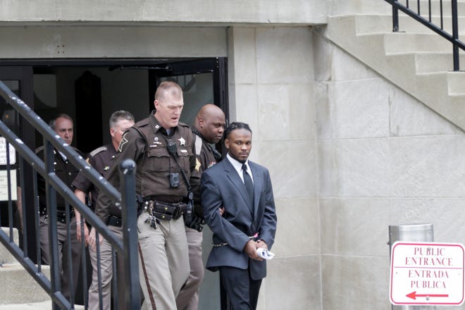 Deshay Hackner is escorted out of the Tippecanoe County Courthouse by sheriff's deputies, Tuesday, April 23, 2019, in Lafayette. Hackner is accused of killing Dewone Broomfield and Mary Woodruff in Vanderburgh County.
