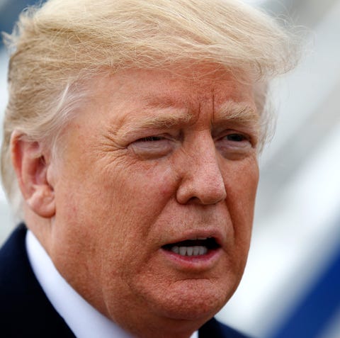 President Donald Trump takes questions from a...