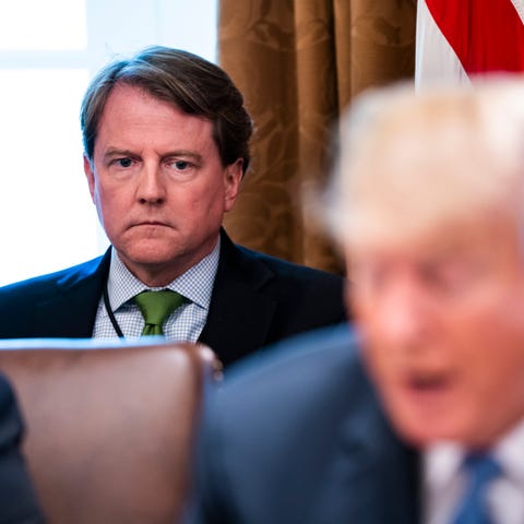 Then-White House counsel Don McGahn and President...