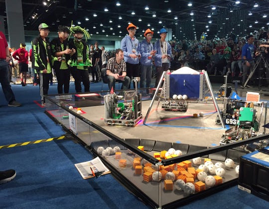 Robotics teams compete in the FIRST Tech Challenge qualifying rounds at Cobo Center in Detroit on Wednesday.