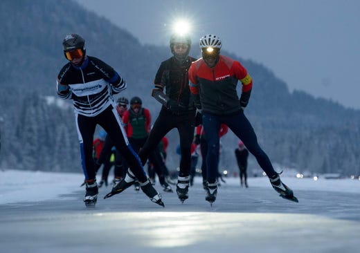 TOPSHOT - Dutch ice skaters participate in a 200km marathon on frozen Lake Weissensee in Austrian Alps near the village of Techendorf on January 31, 2019, used as a replacement for a traditional race, the "Elfstedentocht", which was linking 11 Dutch cities via canals but couldn't take place since 1997 because of global warming. - Over the past week and a half several thousand ice skaters, almost all of them Dutch, have flocked to the the Weissensee lake, 930m above sea level in southern Austria, in order to recreate outdoor ice skating's Holy Grail: the "Elfstedentocht". (Photo by JOE KLAMAR / AFP)JOE KLAMAR/AFP/Getty Images ORIG FILE ID: AFP_1CW62Y